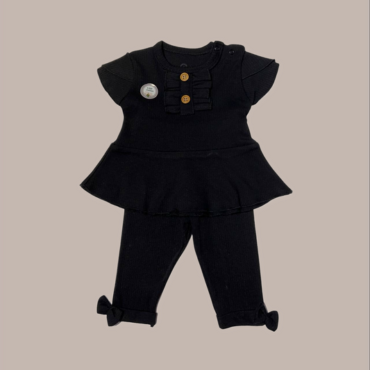 Black set decorated with ruffles